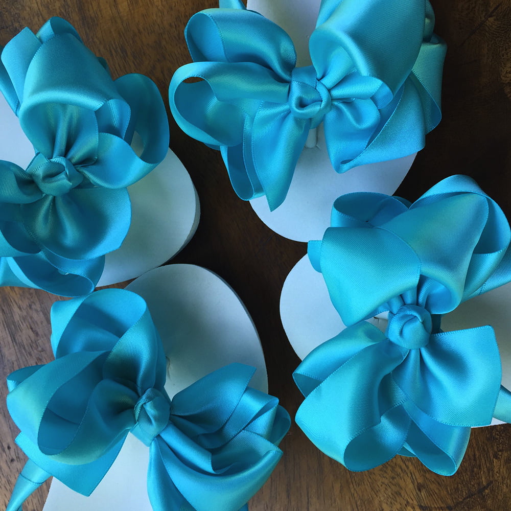 Large Tiffany Blue coloured bows on high wedge heel flip flops