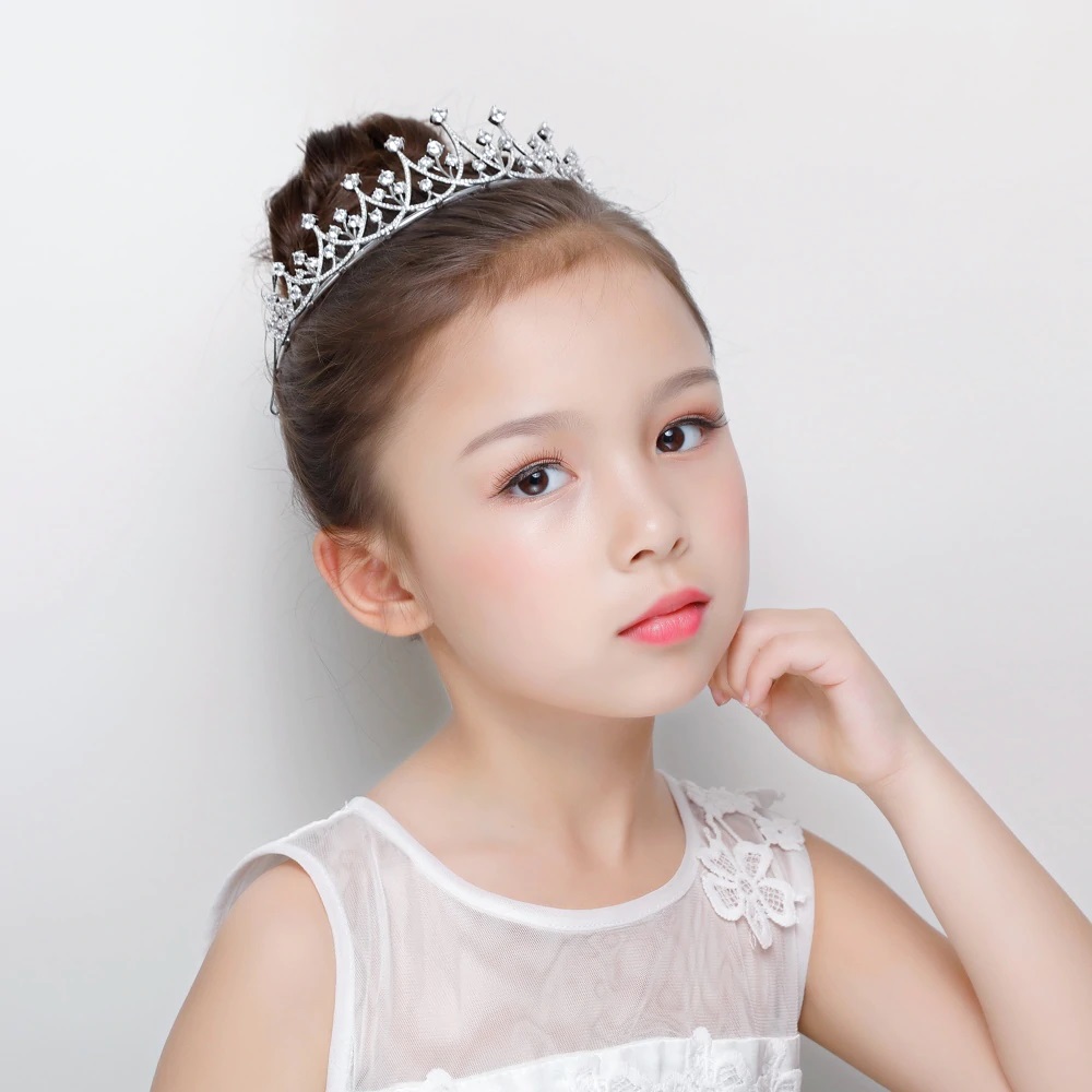 Flower Girl wearing a cut crystal Tiara