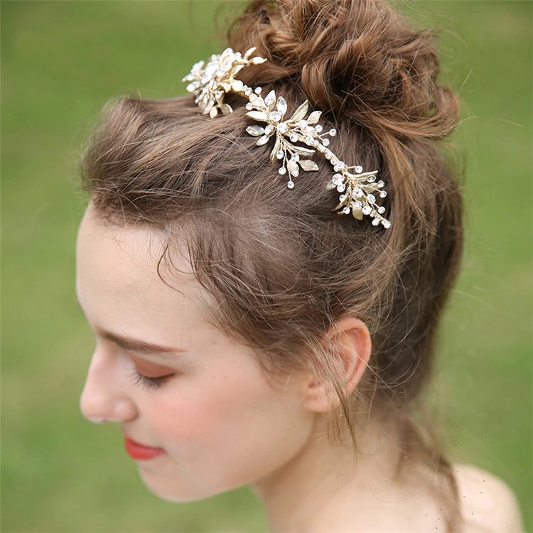 Bride wearing a Gold Rhinestone Hair Vine